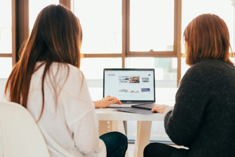 Two women at their computer